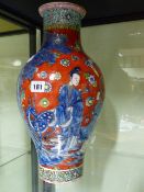 A CHINESE CLOBBERED BLUE AND WHITE BALUSTER VASE DECORATED WITH DEER AND FIGURES IN A LANDSCAPE. H.