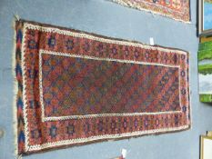 ANTIQUE BELOUCH RUG. 175 x 90cms.