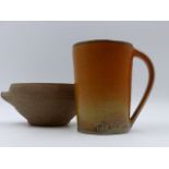 A STONEWARE POTTERY MUG AND TWO HANDLED POTTERY BOWL BY DAVID LEACH. 10cms. HIGH AND 11.5cms.