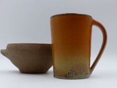 A STONEWARE POTTERY MUG AND TWO HANDLED POTTERY BOWL BY DAVID LEACH. 10cms. HIGH AND 11.5cms.
