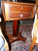 AN EARLY VICTORIAN MAHOGANY PEDESTAL WORK TABLE ON OCTAGONAL COLUMN AND PLATFORM BASE. H.74cms.