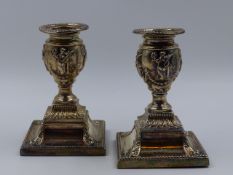 A PAIR OF SILVER HALLMARKED VICTORIAN DWARF CANDLESTICKS, RICHARD HODD & SON, LONDON 1885. THE URN