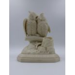 A VICTORIAN PARIANWARE OWL GROUP ENTITLED MATCH MAKING. 20cms. HIGH