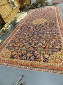 AN ANTIQUE COUNTRY HOUSE PERSIAN GALLERY CARPET. 654 x 275cms.