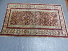 AN ANTIQUE CAUCASIAN KUBA RUG. 162 x 104cms.