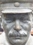 20th.C. RUSSIAN SCHOOL. AN OVER LIFE SIZE BRONZE BUST OF JOSEPH STALIN. H. 54cms.