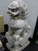 AN IMPRESSIVE PAIR OF CARVED WHITE MARBLE FOO LIONS ON SQUARE PLINTHS. H. 108cms.