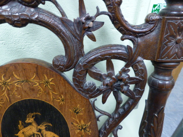 A 19th.C.SWISS BLACK FOREST CARVED AND INLAID ARMCHAIR WITH UNUSUAL SPRUNG SEAT AND INTEGRAL - Image 9 of 48