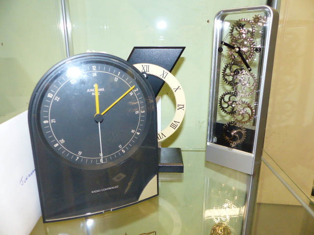 THREE NOVELTY CLOCKS, A JUNGMANS RADIO CONTROLLED CLOCK, AN ART TEMPO CLOCK AND ONE OTHER.