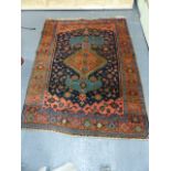 ANTIQUE PERSIAN TRIBAL RUG. 180 x 128cms.