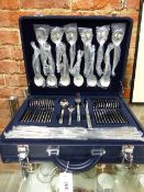 AN AS NEW CASED CANTEEN OF CUTLERY CONTAINED IN A BESPOKE BRIEFCASE.