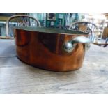 A 19th.C.LARGE OVAL COPPER PAN WITH LID MONOGRAMNED R.C.P. TOGETHER WITH A SIMILAR SMALLER PAN.