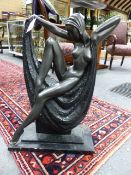 AN ART DECO STYLE FIGURAL GROUP OF A YOUNG LADY POSED ON A DRAPED PLINTH. H.60cms.