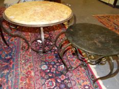 A WROUGHT IRON BASED MARBLE TOP LOW OCCASIONAL TABLE AND A FURTHER SIMILAR SMALLER TABLE. THE