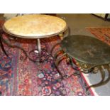 A WROUGHT IRON BASED MARBLE TOP LOW OCCASIONAL TABLE AND A FURTHER SIMILAR SMALLER TABLE. THE