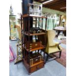 A VICTORIAN MAHOGANY FOUR TIER WHATNOT WITH SPINDLE SUPPORTS AND A DEEP BASE DRAWER. MEASURES 50 x