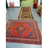 AN ANTIQUE CAUCASIAN RUG. 273 x 106cms. TOGETHER WITH AN ANTIQUE PERSIAN AFSHAR RUG. 170 x