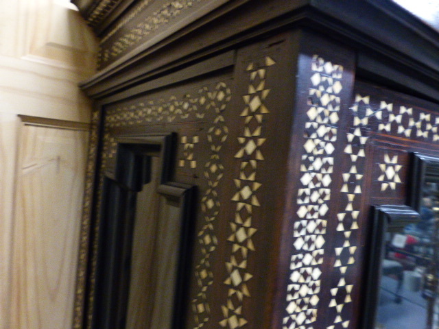 A COLONIAL MOORISH STYLE HARDWOOD AND INLAID GLAZED DISPLAY VITRINE CABINET. W.112 x H.175cms. - Image 32 of 48