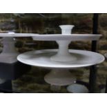FIVE WHITE GLAZED CONTINENTAL COMPORTS OF VARYING SIZES. D.30, 32, 34, 35 & 38cms.