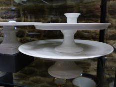 FIVE WHITE GLAZED CONTINENTAL COMPORTS OF VARYING SIZES. D.30, 32, 34, 35 & 38cms.