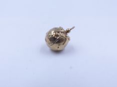 A VINTAGE MASONIC ORB PENDANT. THE BALL FOLDS OUT COMPLETELY OPEN WITH INDIVIDUAL HINGES INTO THE