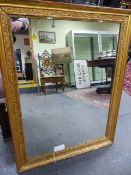 A 19th.C.GILT FRAMED WALL MIRROR. 69 x 9cms.