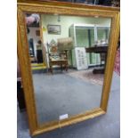 A 19th.C.GILT FRAMED WALL MIRROR. 69 x 9cms.