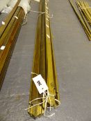 A GROUP OF LARGE BRASS TRIANGULAR SECTION STAIR RODS WITH GOTHIC REVIVAL DECORATED ENDS. 10 x