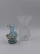 A LALIQUE MOULDED GLASS VASE WITH BIRD AND FRUIT DECORATION. H.13cms. AND A SMALL MURANO EWER OF