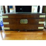 A VICTORIAN MAHOGANY CAMPAIGN TYPE DESK TOP BOX WITH BRASS MOUNTS AND PLAQUE READING LIEUT.T.MADOCKS