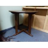 AN ARTS AND CRAFTS SMALL OCCASIONAL TABLE IN THE MANNER OF PETER WAALS. D.54cms.
