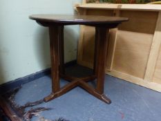 AN ARTS AND CRAFTS SMALL OCCASIONAL TABLE IN THE MANNER OF PETER WAALS. D.54cms.