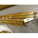 A SET OF TWELVE LARGE BRASS TRIANGULAR SECTION STAIR RODS. L.178cms.