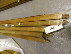 A SET OF TWELVE LARGE BRASS TRIANGULAR SECTION STAIR RODS. L.178cms.