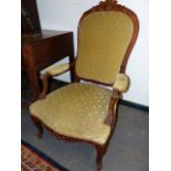 A PAIR OF FRENCH CARVED OAK SHOW FRAME LARGE OPEN ARMCHAIRS WITH UPHOLSTERED PANEL BACKS.