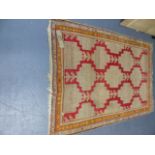 AN ANTIQUE CAUCASIAN RUG. 178 x 126cms.