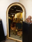 A LARGE VICTORIAN OVERMANTLE MIRROR WITH OAK LEAF BORDER DECORATION. H.200 x W.105cms.