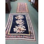 TWO ANTIQUE CAUCASIAN RUGS. LARGEST 254 x 102cms. (2)