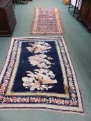 TWO ANTIQUE CAUCASIAN RUGS. LARGEST 254 x 102cms. (2)