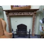 A 19th.C.CARVED PINE FIRE SURROUND, THE MANTLE W.170 x H.146cms.