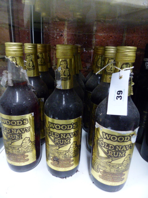 RUM, TWELVE BOTTLES OF WOODS GOLD LABEL NAVY RUM.