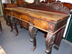 A LARGE WM.IV.MAHOGANY SERVING TABLE WITH CARVED RAISED BACK, INVERTED BREAK FRONT TOP AND ON FOUR