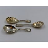 ONE HALLMARKED SILVER CADDY SPOON DATED 1866 LONDON TOGETHER WITH A FURTHER TWO WHITE METAL CADDY