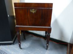 A WM.IV.MAHOGANY CELLARETTE ON STAND IN THE MANNER OF GILLOWS RETAINING ORIGINAL TIN LINER. W.
