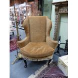A GOOD ANTIQUE QUEEN ANNE STYLE WING BACK ARMCHAIR ON CARVED CABRIOLE LEGS. W.89 x H.111 cms.