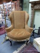 A GOOD ANTIQUE QUEEN ANNE STYLE WING BACK ARMCHAIR ON CARVED CABRIOLE LEGS. W.89 x H.111 cms.