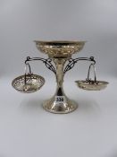 A SILVER EPERGNE WITH TWO BRANCHES HOLDING PIERCED BASKETS. DATED 1911, BIRMINGHAM, APPROXIMATE