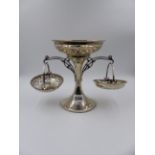 A SILVER EPERGNE WITH TWO BRANCHES HOLDING PIERCED BASKETS. DATED 1911, BIRMINGHAM, APPROXIMATE