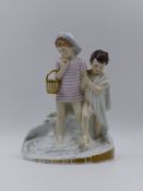 A PORCELAIN FIGURE GROUP THE BATHERS SIGNED A BERGES 22cms. HIGH.