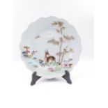A CHINESE EXPORT FAMILLE ROSE PLATE DECORATED WITH A DEER. D.24cms.